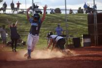 Centennial High School's Ashlynn Heck (8) belts a home run against Shadow Ridge High School in ...