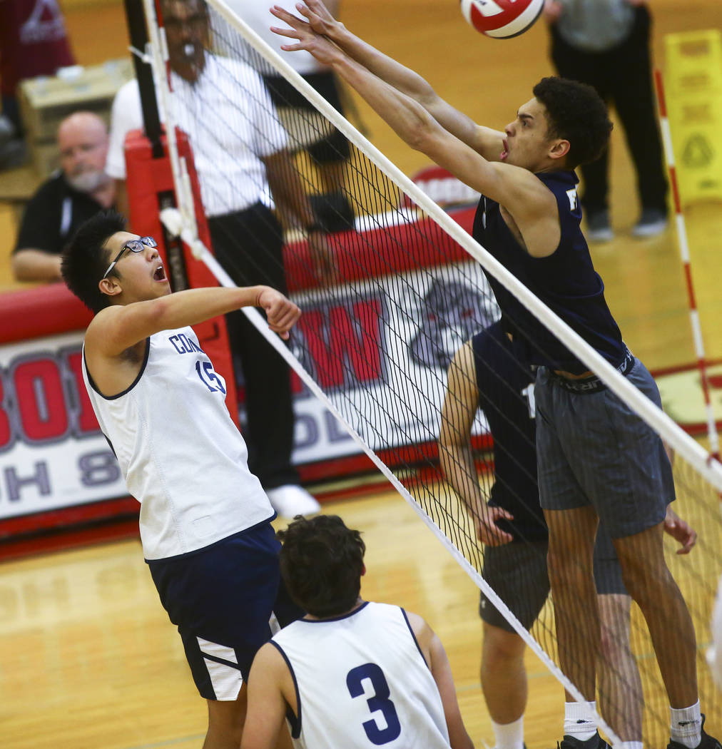 Coronado's Justin Fan (15) gets the ball past Foothill's Jace Roquemore (3) during the Desert R ...