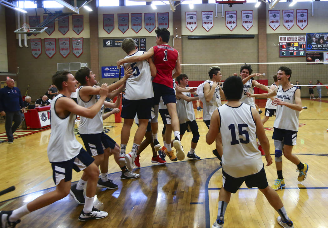 Coronado players celebrate their victory over Foothill in the Desert Region tournament champion ...