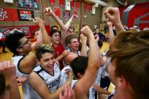 Coronado players celebrate their victory over Foothill in the Desert Region tournament champion ...