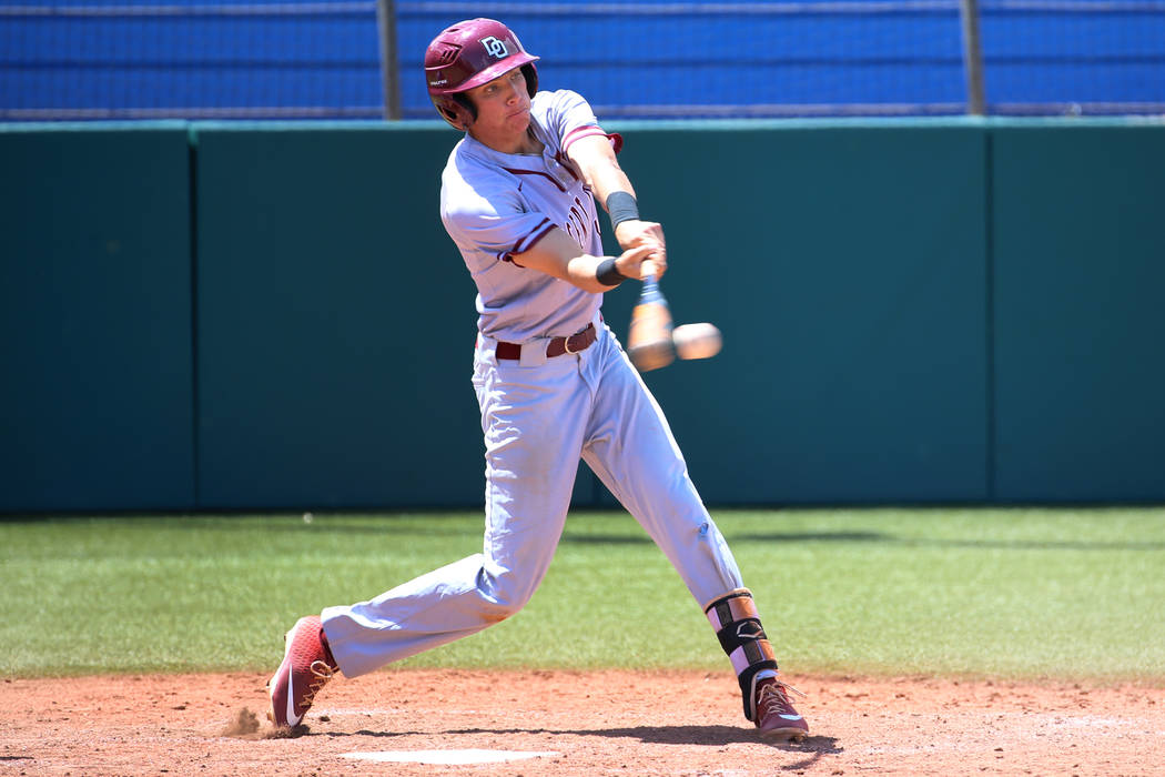Desert Oasis' (8) hits a walkout single for an RBI to win against Las Vegas in the Southern Nev ...