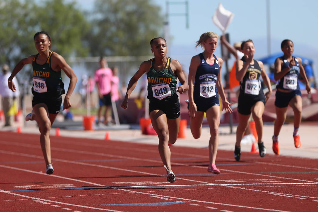 Rancho's Amir'a Edmond (843) runs for first place, followed by teammate Aniya Smith (843), and ...