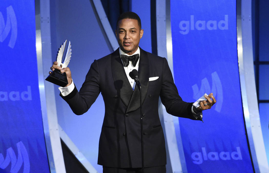 CNN news anchor Don Lemon accepts the outstanding TV journalism segment award at the 30th annua ...