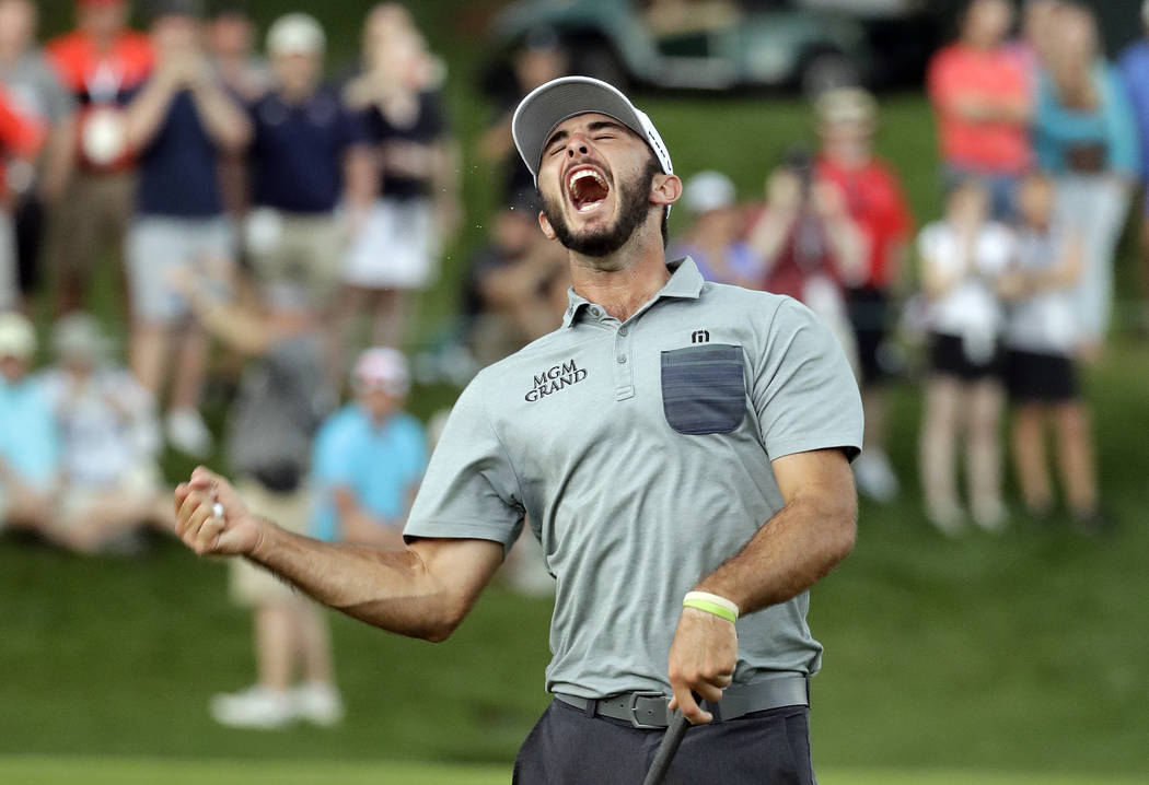 Max Homa celebrates after winning the Wells Fargo Championship golf tournament at Quail Hollow ...