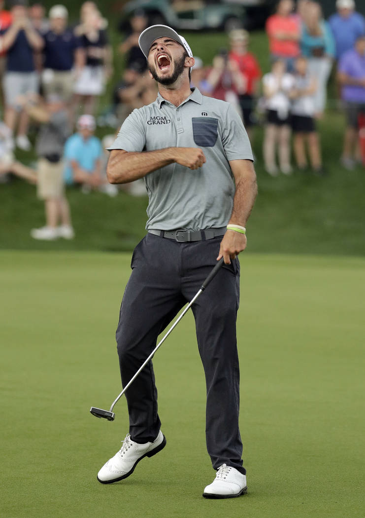 Max Homa celebrates after winning the Wells Fargo Championship golf tournament at Quail Hollow ...