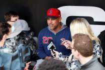 Boston Red Sox manager Alex Cora (20) talks with the media before a baseball game against the C ...
