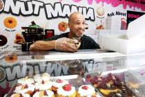 Brett Raymer, a star of the TV show "Tanked" and owner of Donut Mania, at his shop in Las Vegas ...