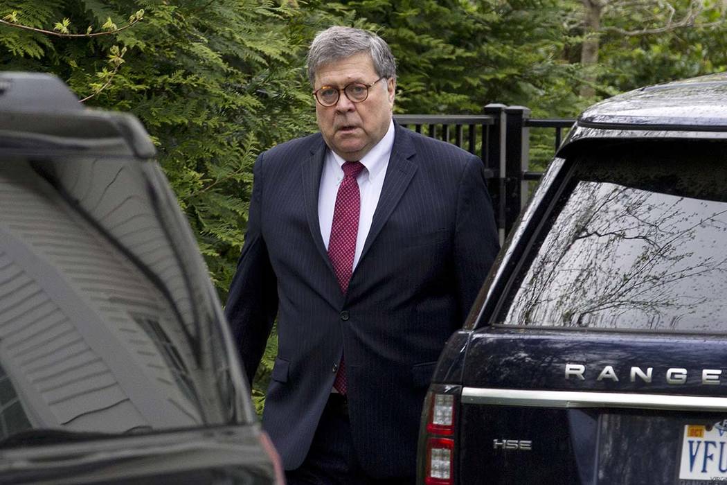 Attorney General William Barr leaves his home in McLean, Va., on Monday, April 15, 2019. Barr t ...