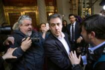 Michael Cohen, former attorney to President Donald Trump, leaves his apartment building before ...