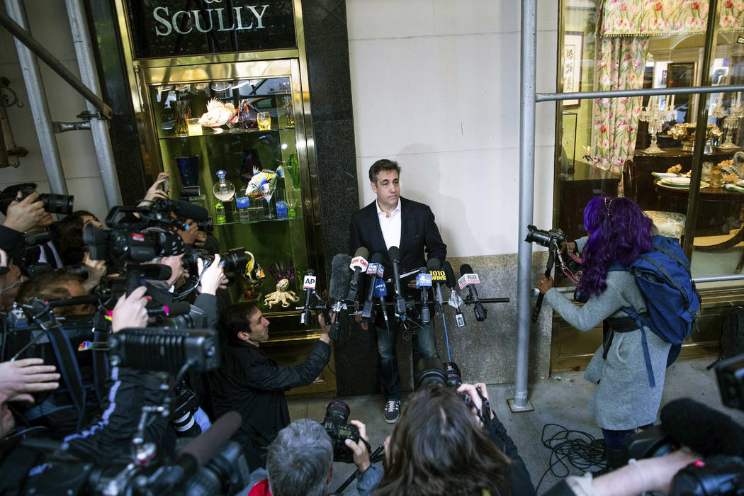 Michael Cohen, former attorney to President Donald Trump, holds a press conference outside his ...