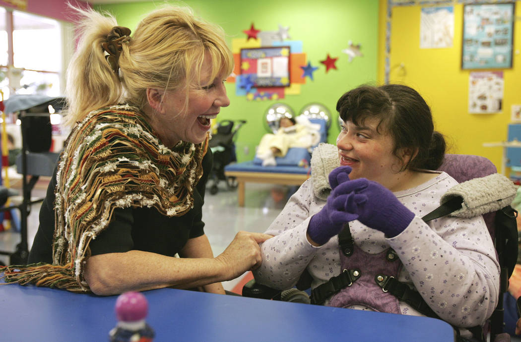 SW-SP/VIEW--Linda Smith, chief development officer, left, interacts with Tiffany Hobbs, 25, at ...