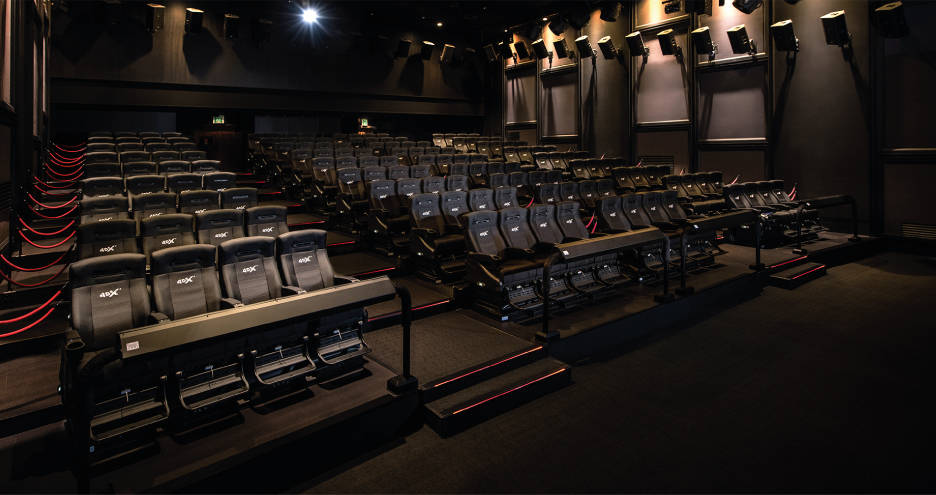 Seats in Red Rock Resort's 4DX movie theater come four to a pod and move as one as they pitch, ...