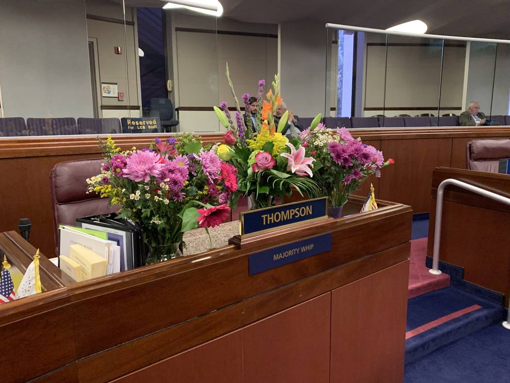 Flower bouquets in memory of Assemblyman Tyrone Thompson were placed on his desk in Assembly ch ...