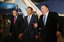 Secretary of State Mike Pompeo, right walks with Acting Assistant Secretary for Near Eastern Af ...
