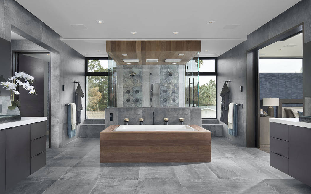 The master bath has a modern, but warm feel. (Studio G Architecture)
