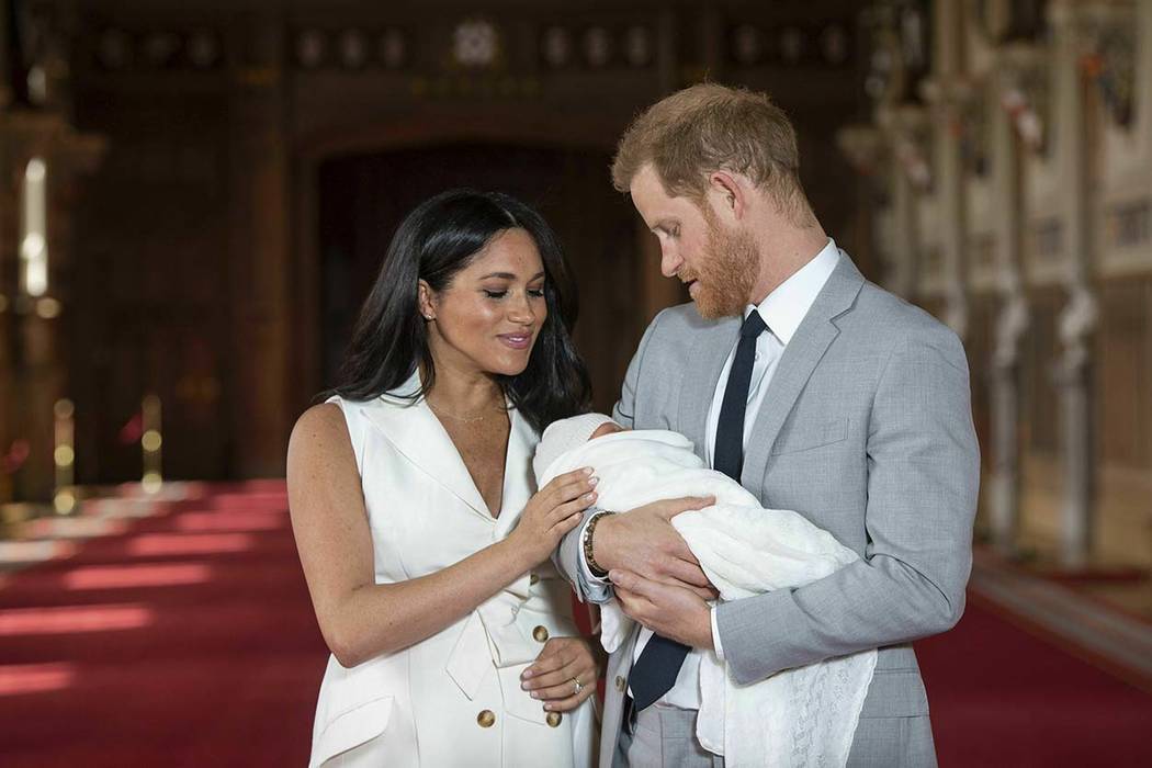 Britain's Prince Harry and Meghan, Duchess of Sussex, during a photocall with their newborn son ...