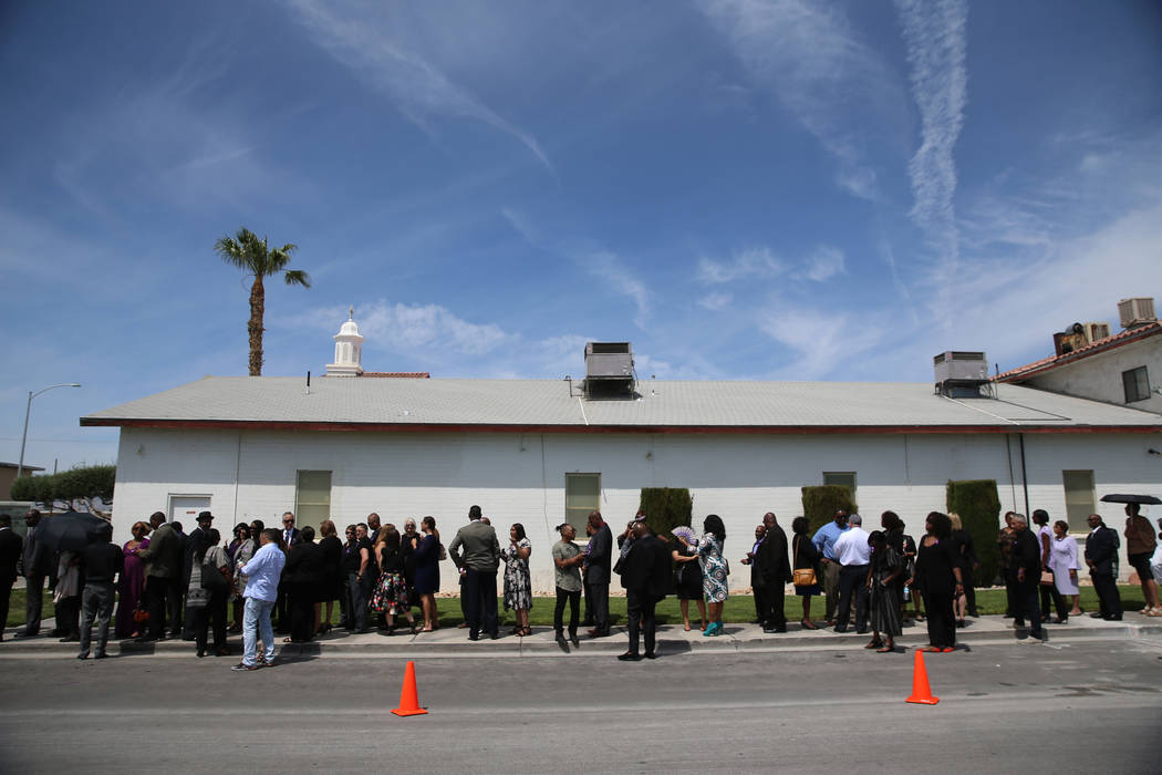 People stand in line to attend the funeral service for Assemblyman Tyrone Thompson, who died Ma ...