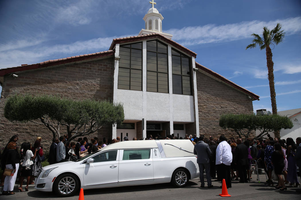 People stand in line to attend the funeral service for Assemblyman Tyrone Thompson, who died Ma ...