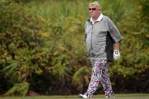 FILE - In this Dec. 15, 2018, file photo John Daly walks on the ninth green during the first ro ...