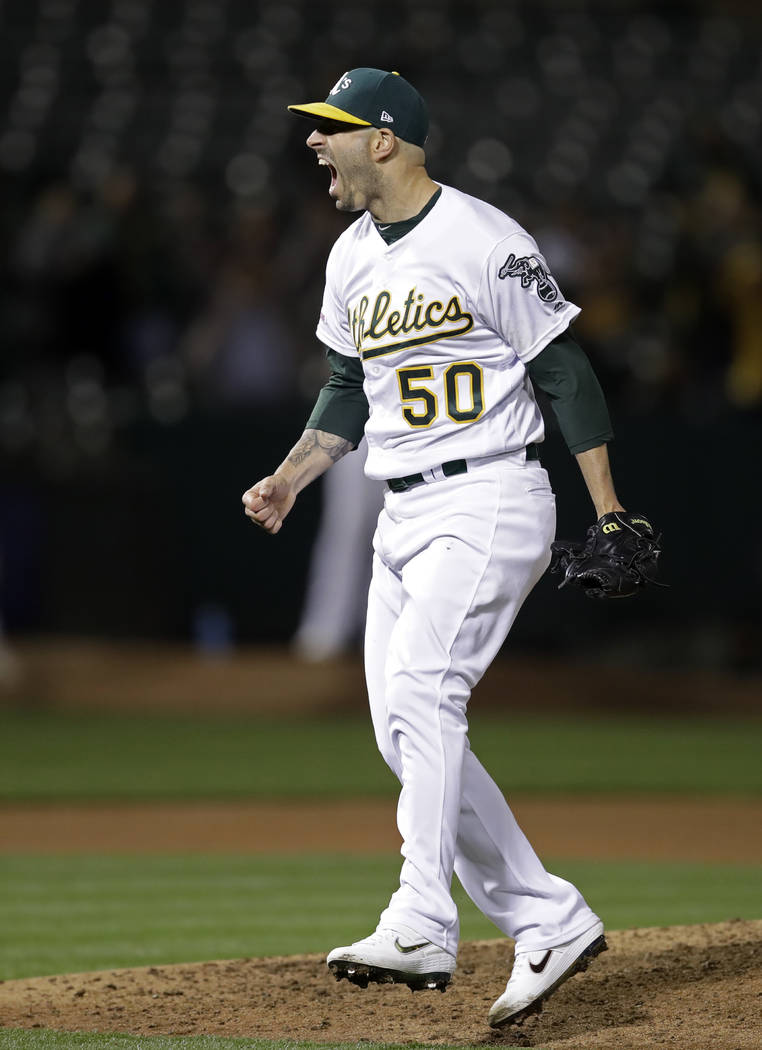 Oakland Athletics' Mike Fiers celebrates after pitching a no hitter against the Cincinnati Reds ...