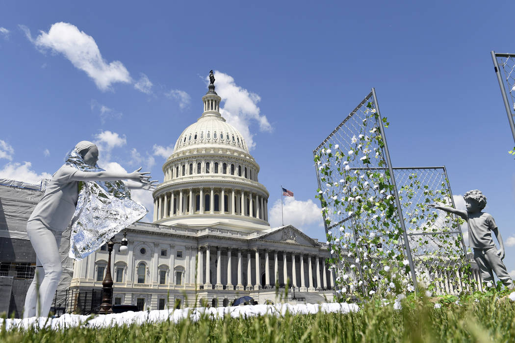 An art installation, on display outside the Capitol in Washington, Tuesday, May 7, 2019, shows ...