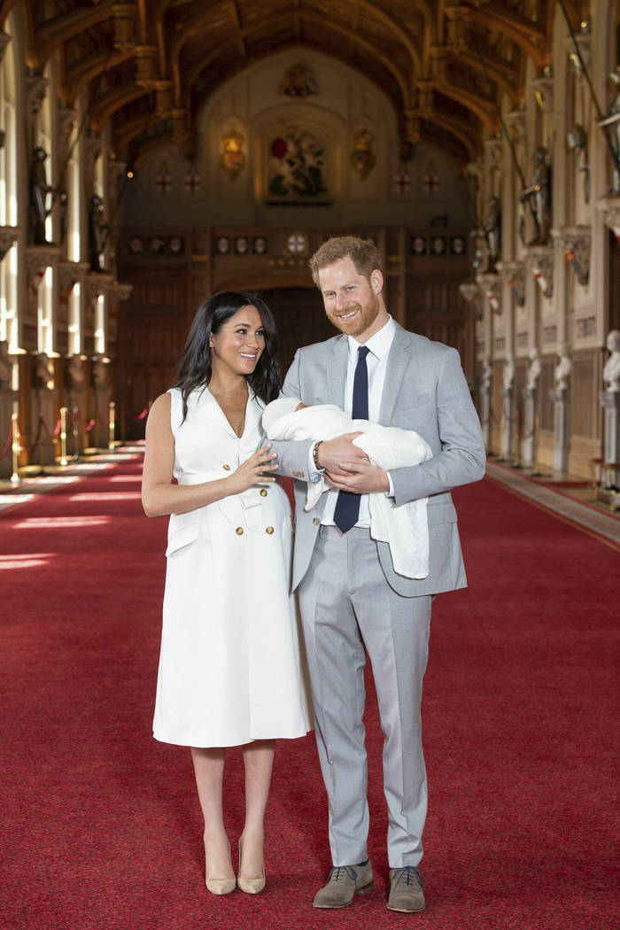 Britain's Prince Harry and Meghan, Duchess of Sussex, during a photocall with their newborn son ...