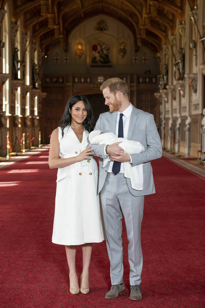 Britain's Prince Harry and Meghan, Duchess of Sussex, during a photocall with their newborn son ...