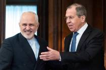 Russian Foreign Minister Sergey Lavrov, right, and Iranian Foreign Minister Mohammad Javad Zari ...