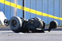 A motorized wheelchair is seen at the scene of a fatal crash at Boulder Highway and Sunset Road ...