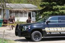 In this Monday, May 6, 2019 photo, St. Joseph County Sheriff deputies stand outside the site wh ...