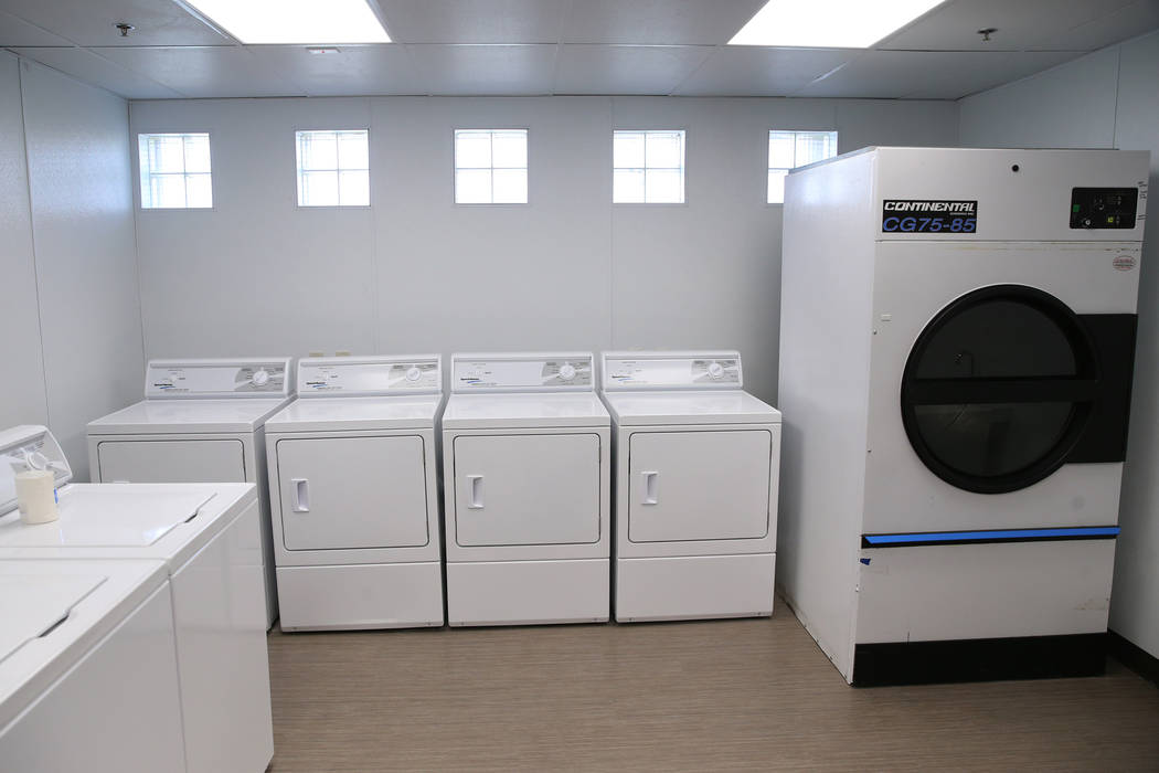 A renovated laundry room at the Shade Tree shelter in North Las Vegas is photographed during a ...
