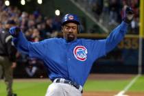 Chicago Cubs Doug Glanville scores in the eighth inning on a Tom Goodwin sacrifice fly to tie t ...