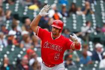 Los Angeles Angels' Albert Pujols tosses his bat after hitting a solo home run in the third inn ...