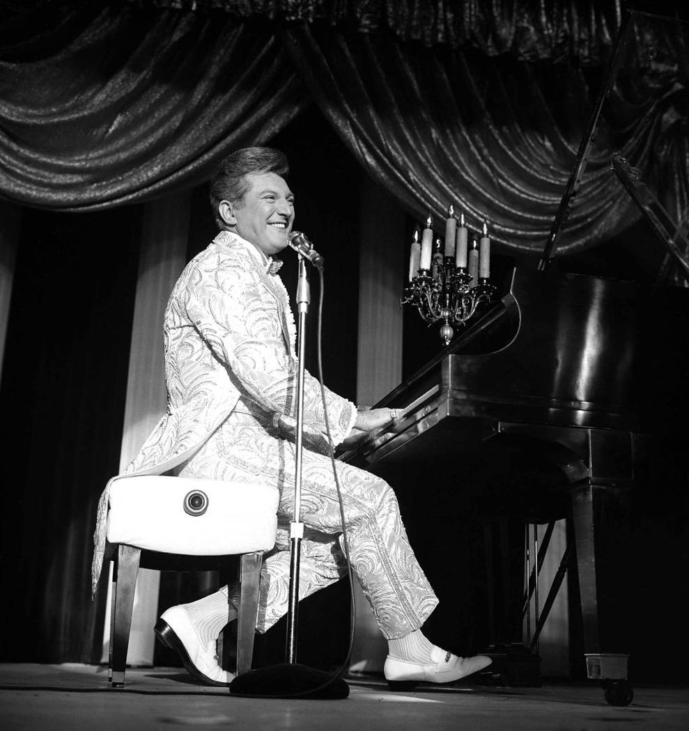 Liberace opening at the Sahara Hotel with Karen Wessler on June 21, 1966. (Las Vegas News Bureau)