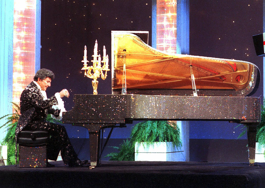 Liiberace plays the piano on the "Tonight Show Starring Johnny Carson" at NBC studios in Burban ...