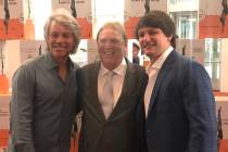 Jon Bon Jovi, Raiders owner Mark Davis; and Bon Jovi's son Jesse Bongiovi are shown at the Clev ...