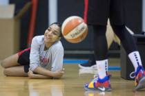 Dominique Wilson, left, stretches after Aces practice on Friday, May 10, 2019, at Cox Pavilion, ...