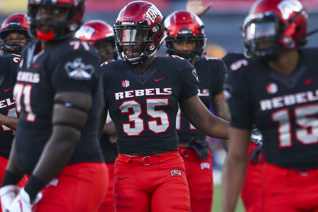Blackout' uniforms something to look forward to for Rebels - Las Vegas Sun  News