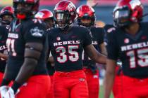 UNLV players warm up before a football game against Prairie View A&M Panthers at Sam Boyd Stadi ...