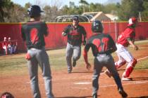 Las Vegas' first baseman Trevor Johnson (20) scores a run during a baseball game at Arbor View ...