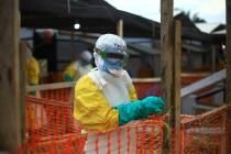 An Ebola health worker is seen April 16, 2019, at a treatment center in Beni, Eastern Congo. Th ...
