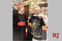 Pope Francis smiles after receiving a Golden Knights jersey. (GoldenKnights/Twitter)