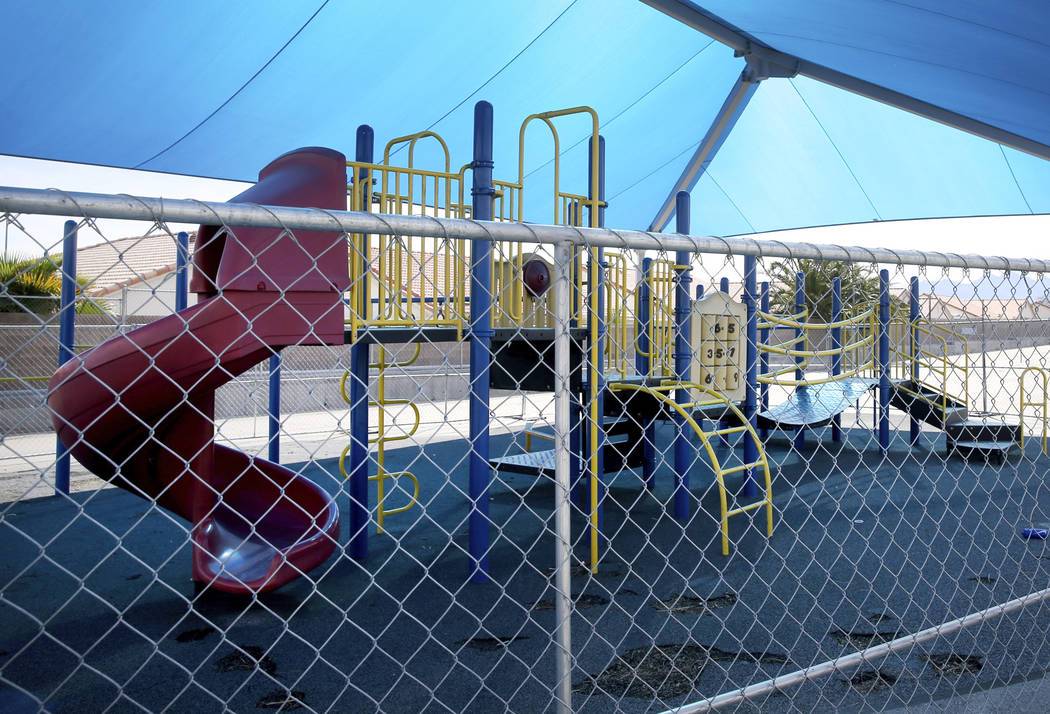 One of two closed playgrounds at Watson Elementary School in North Las Vegas Friday, April 5, 2 ...