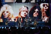 In this April 15, 2012, file photo, Guns N' Roses performs with singer Myles Kennedy after thei ...