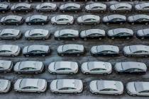In this Dec. 5, 2018 file photo, hundreds of Chevrolet Cruze cars sit in a parking lot at Gener ...