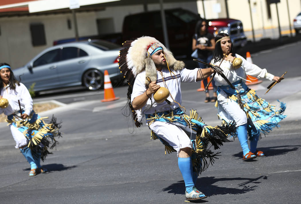 Members of Danza del Carrizo perform during the Helldorado Parade along Fourth Street in downto ...