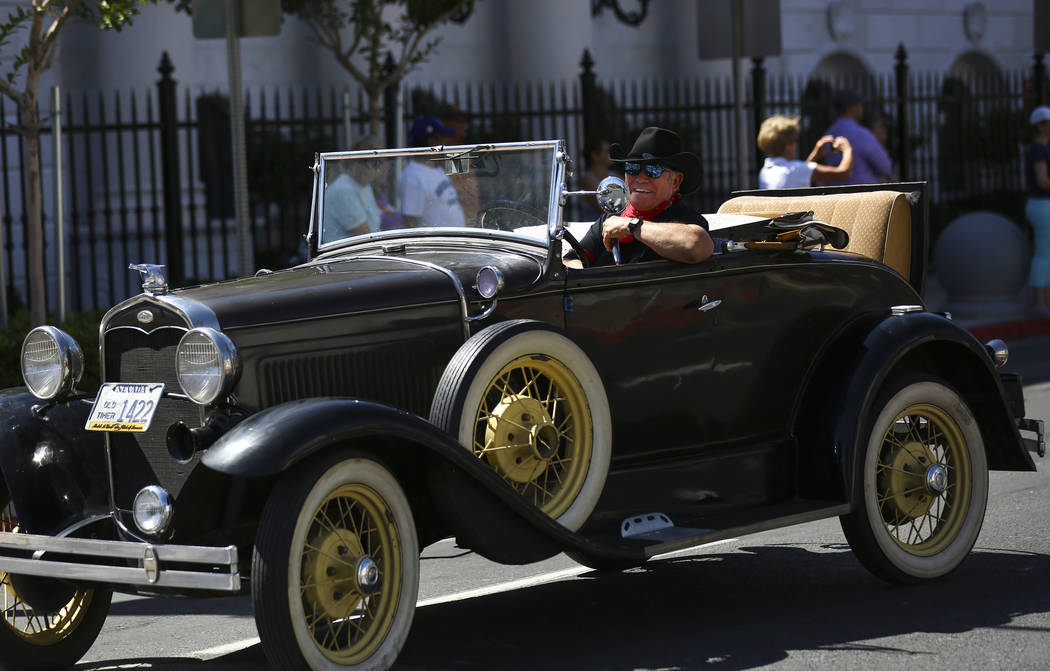 A member of the Las Vegas Valley Model A Ford Club participates in the Helldorado Parade along ...