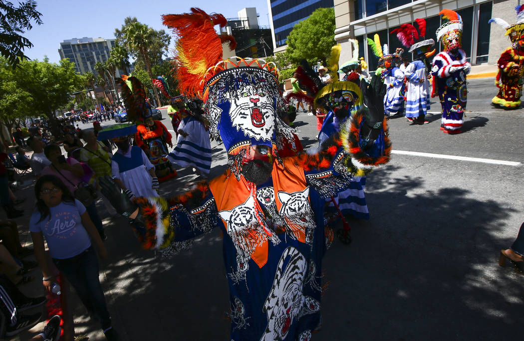 Members of Comparsa Fiesta Morelense perform during the Helldorado Parade along Fourth Street i ...