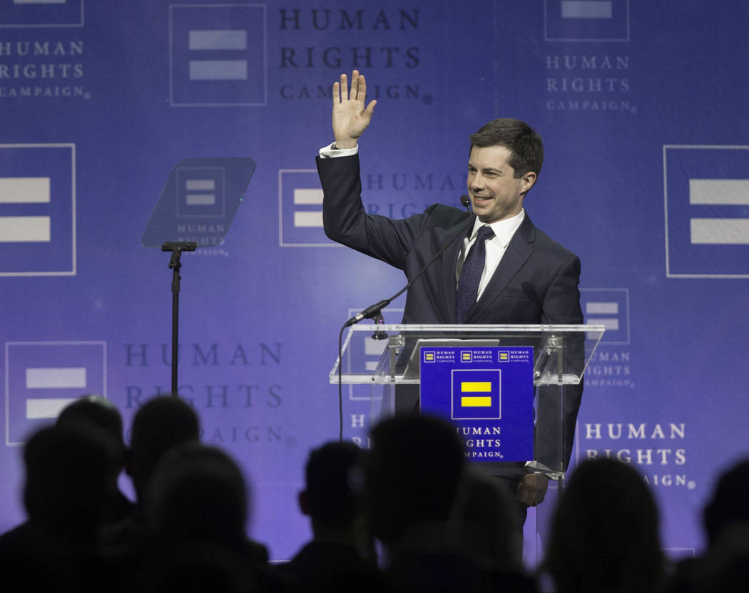 Democratic presidential candidate Pete Buttigieg waves to the audience at the 14th Annual HRC L ...