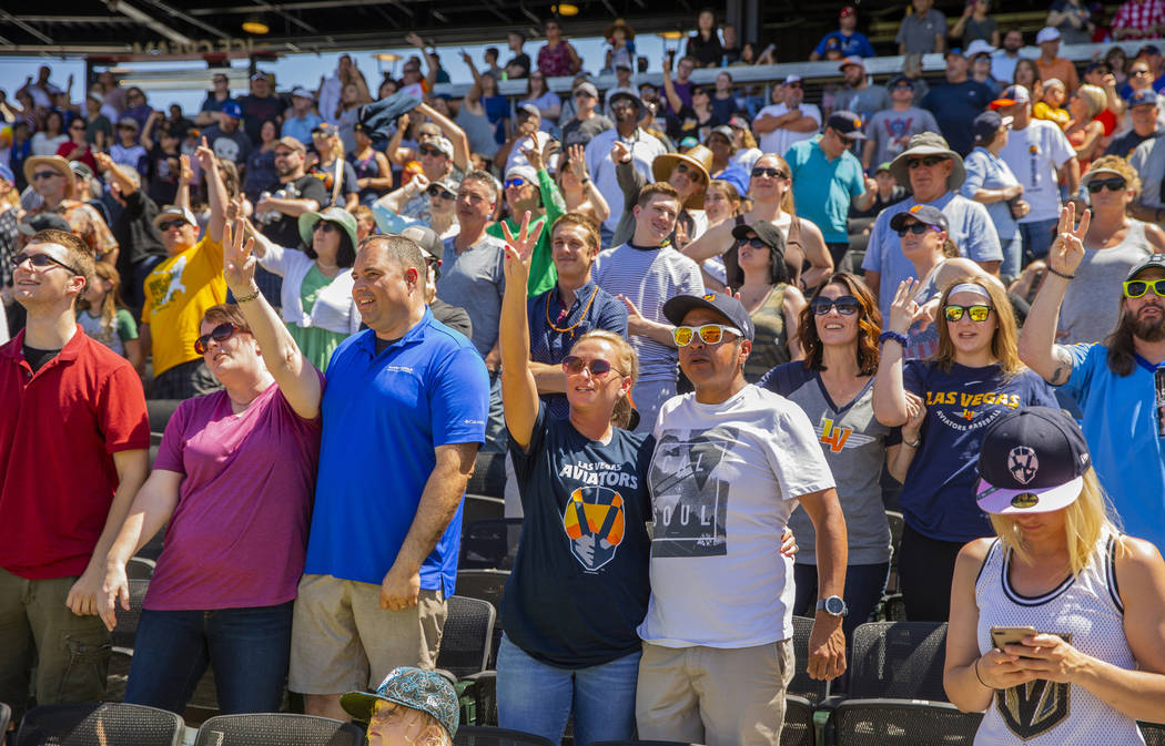 Aviators fans sing "take Me Out to the Ballpark" during a break in the game versus th ...